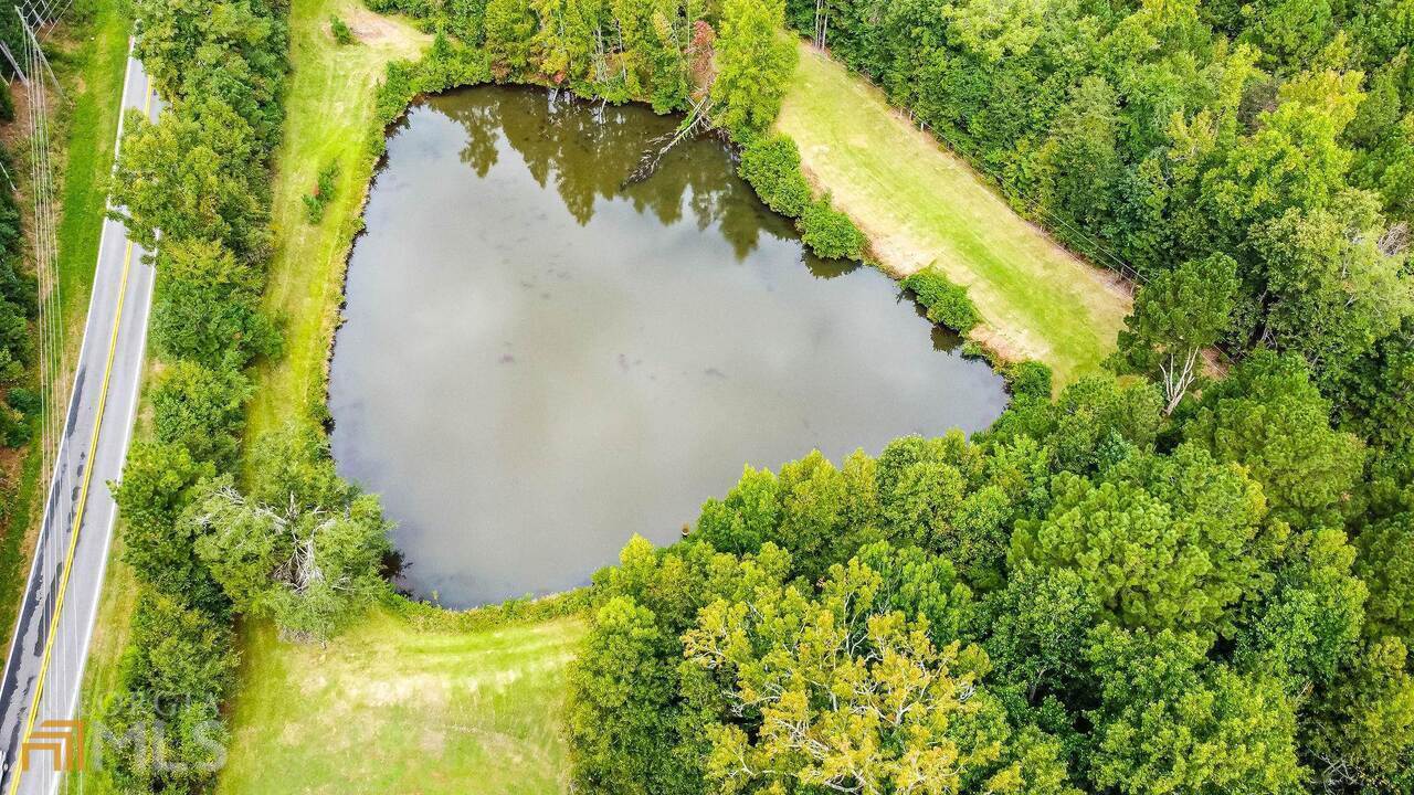 0 Emmett Still Road, Unit TRACT 04 Loganville, GA 30052 - Photo 14 of 23 a view of a lake