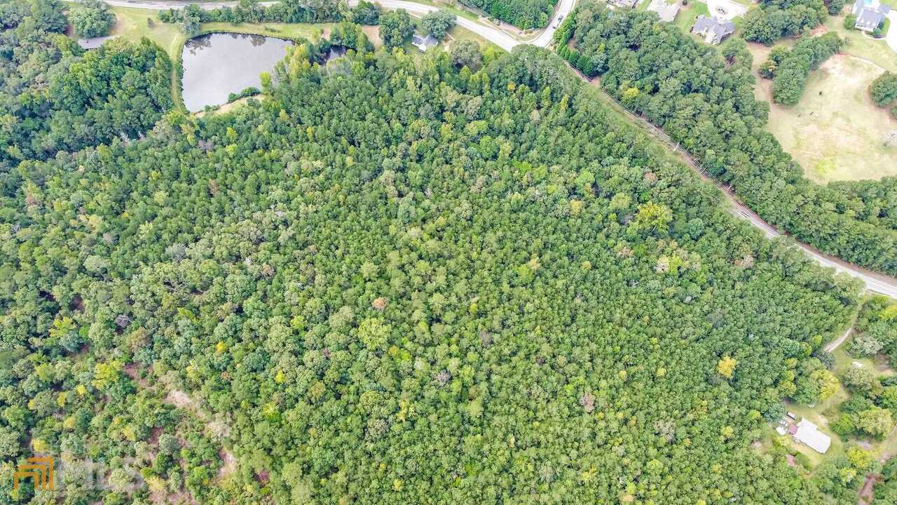 0 Emmett Still Road, Unit TRACT 04 Loganville, GA 30052 - Photo 19 of 23 a view of a green field