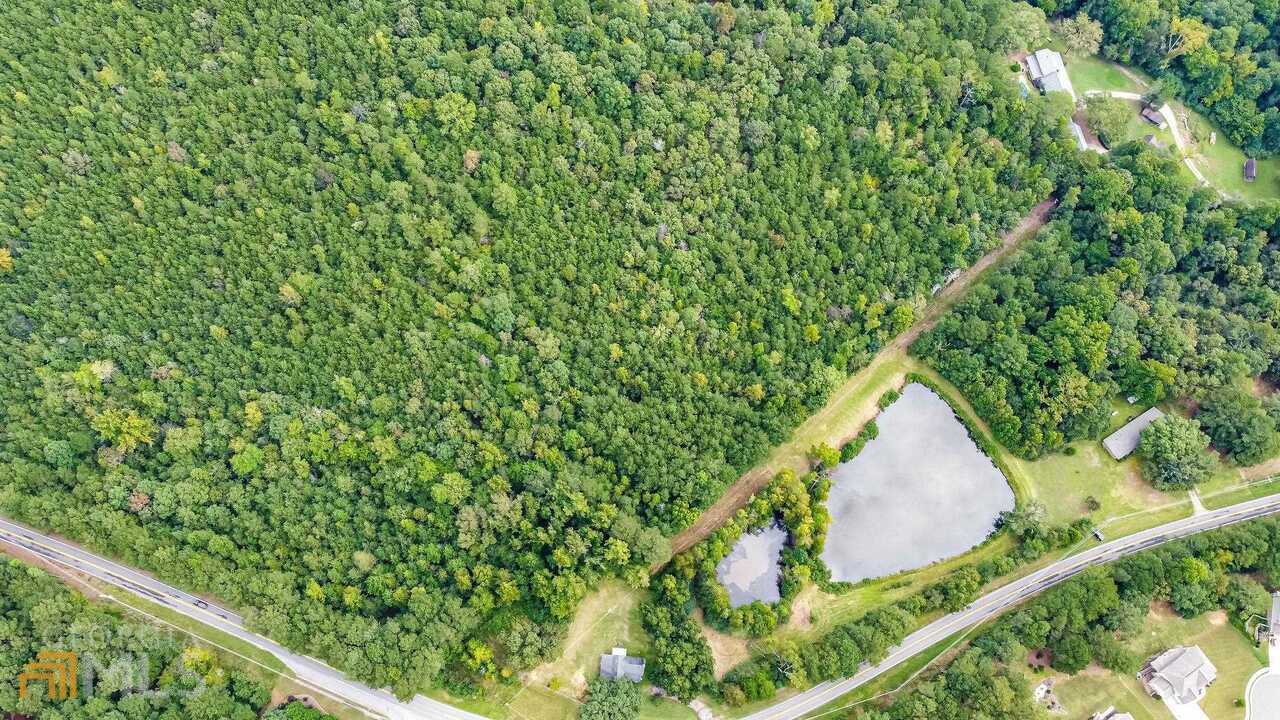 0 Emmett Still Road, Unit TRACT 04 Loganville, GA 30052 - Photo 20 of 23 a view of a forest from a balcony