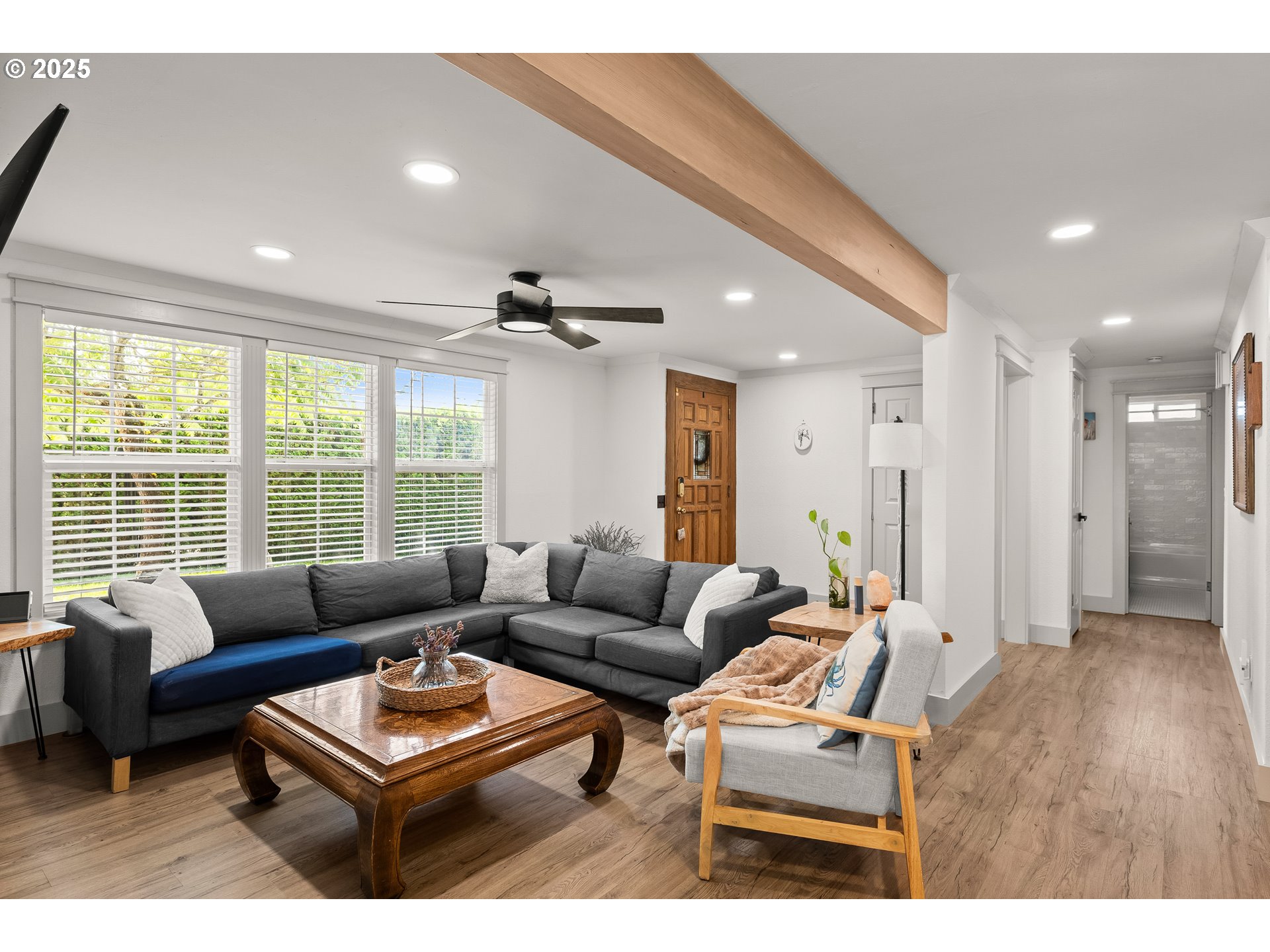 22692 Southwest Highland Drive Sherwood, OR 97140 - Photo 11 of 26 a living room with furniture and a large window