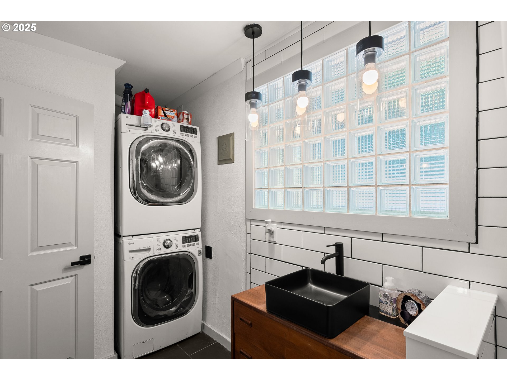 22692 Southwest Highland Drive Sherwood, OR 97140 - Photo 19 of 26 a utility room with sink dryer and washer