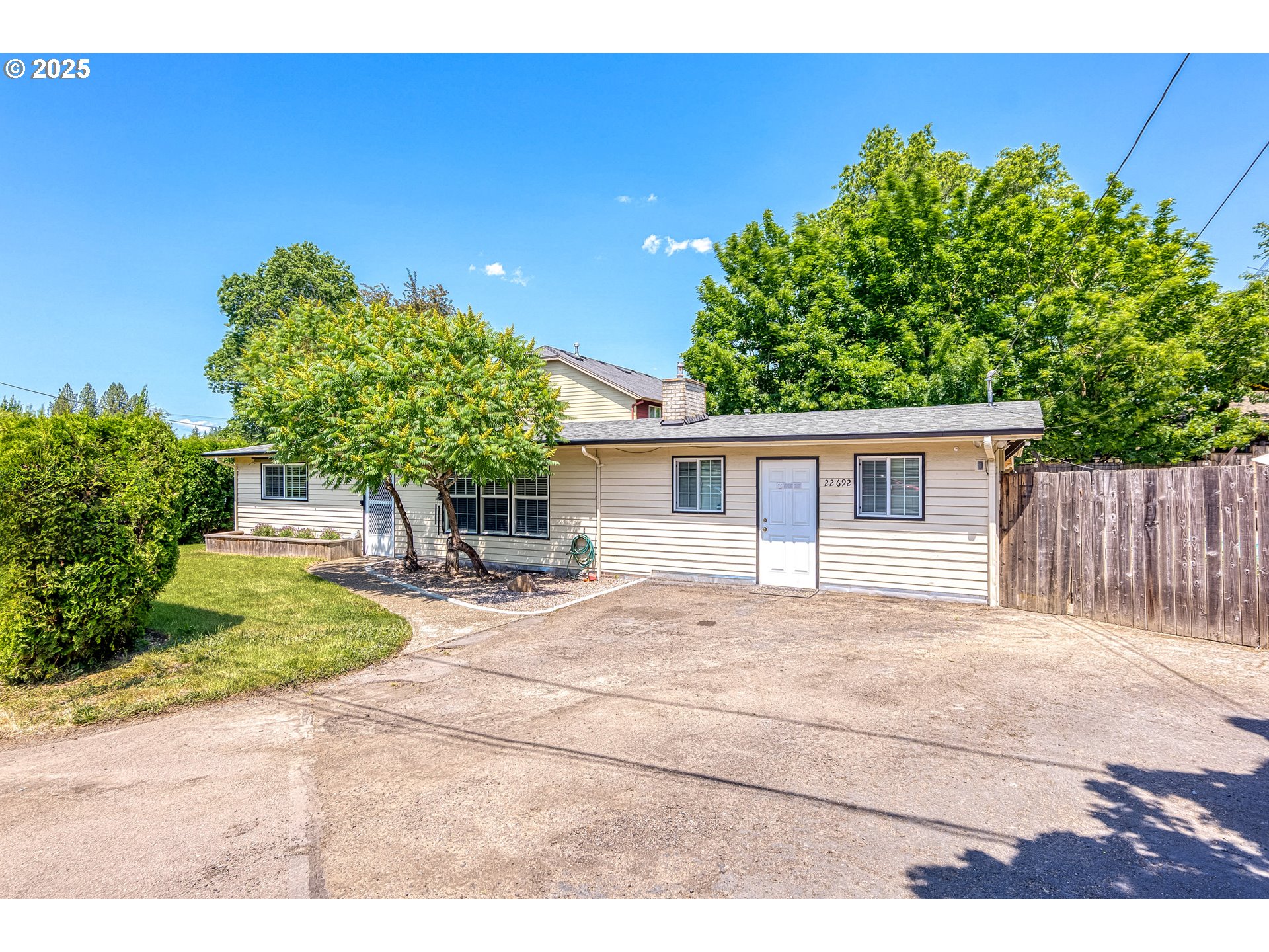 22692 Southwest Highland Drive Sherwood, OR 97140 - Photo 2 of 26 a house view with a outdoor space