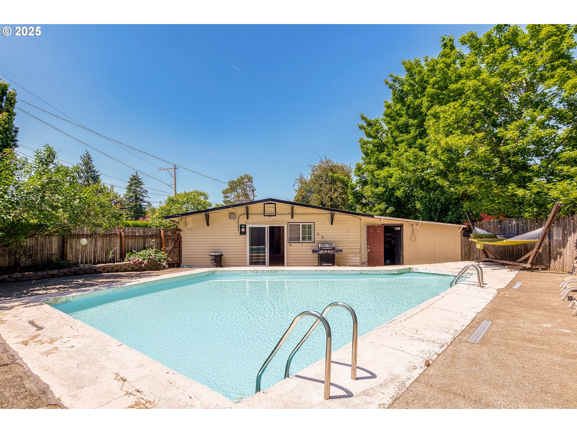 22692 Southwest Highland Drive Sherwood, OR 97140 - Photo 21 of 26 a house view with a seating space