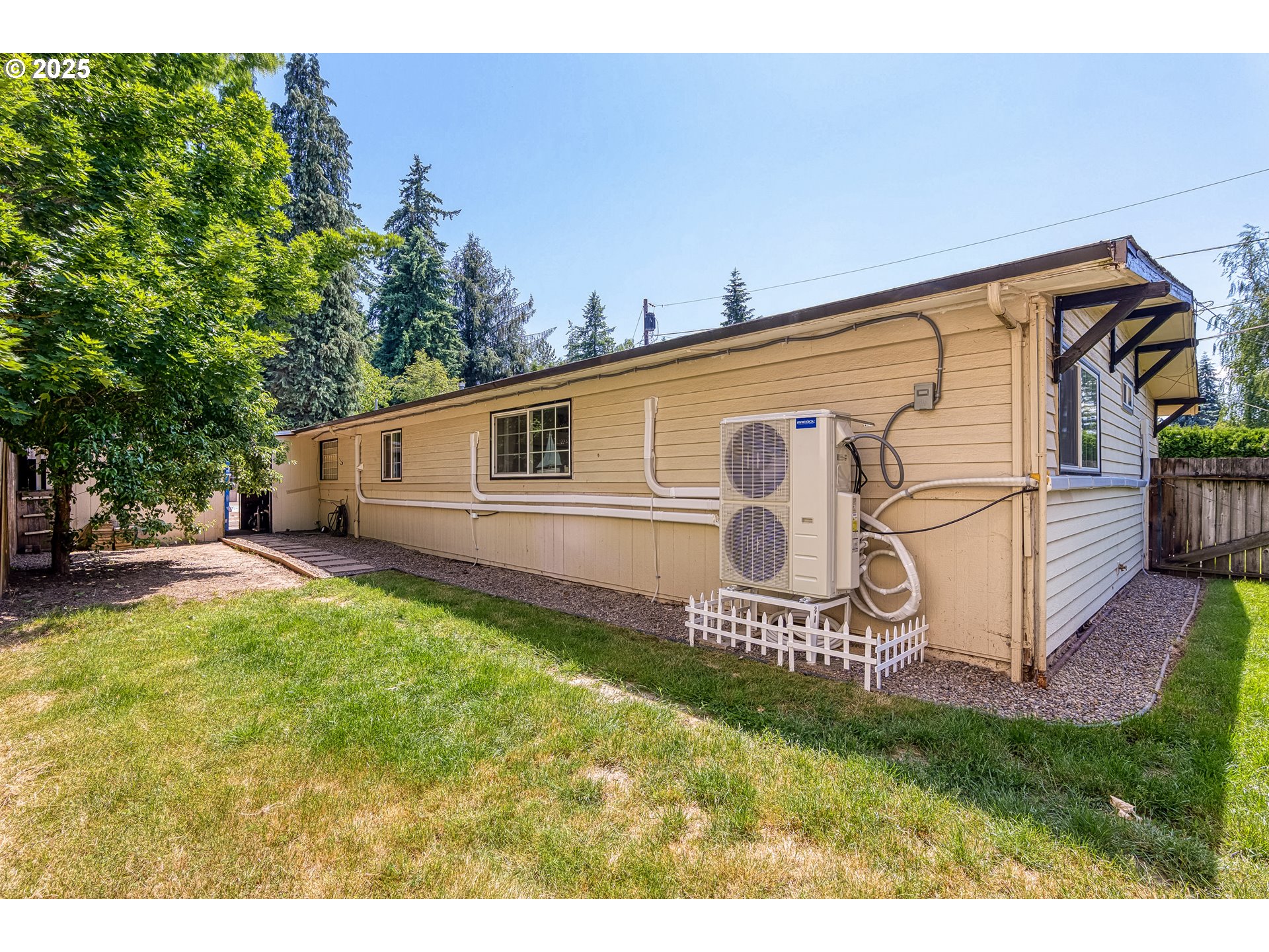 22692 Southwest Highland Drive Sherwood, OR 97140 - Photo 23 of 26 a front view of a house with garden