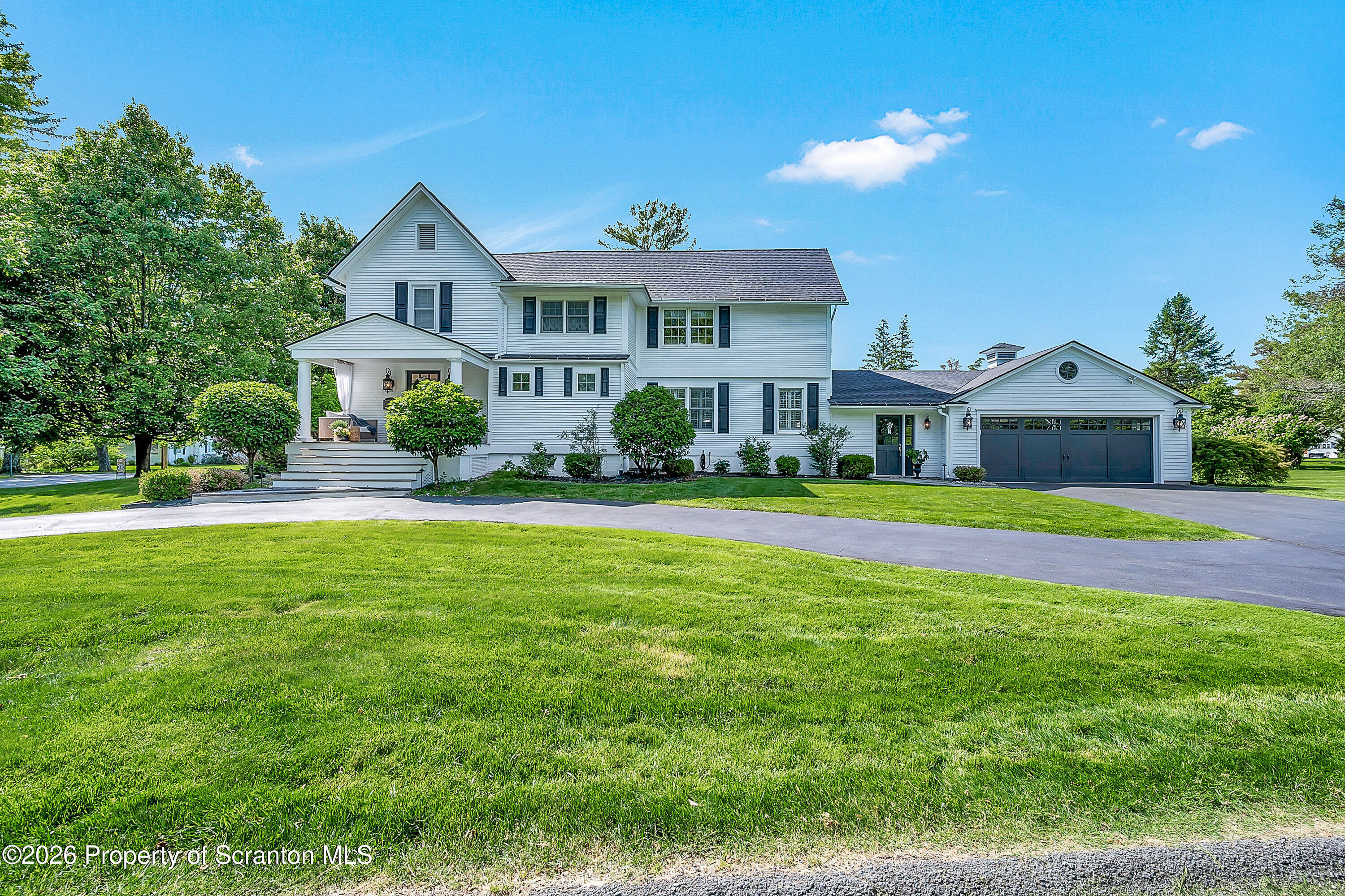 330 Glenburn Road Clarks Green, PA 18411 - Photo 1 of 69 a front view of house with yard and outdoor seating