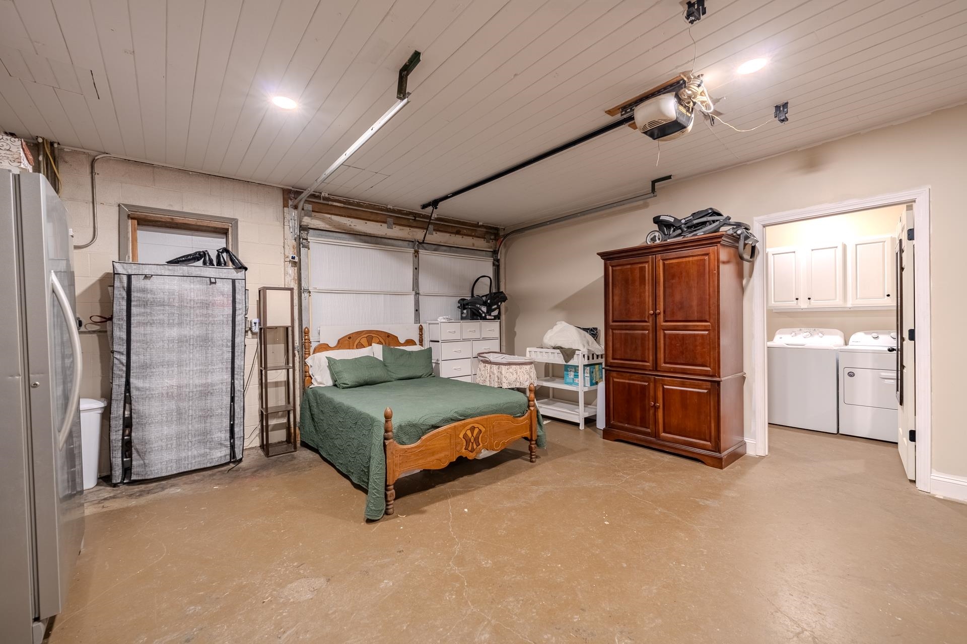 390 Woods Road Adamsville, TN 38310 - Photo 11 of 40 a bedroom with bed and window