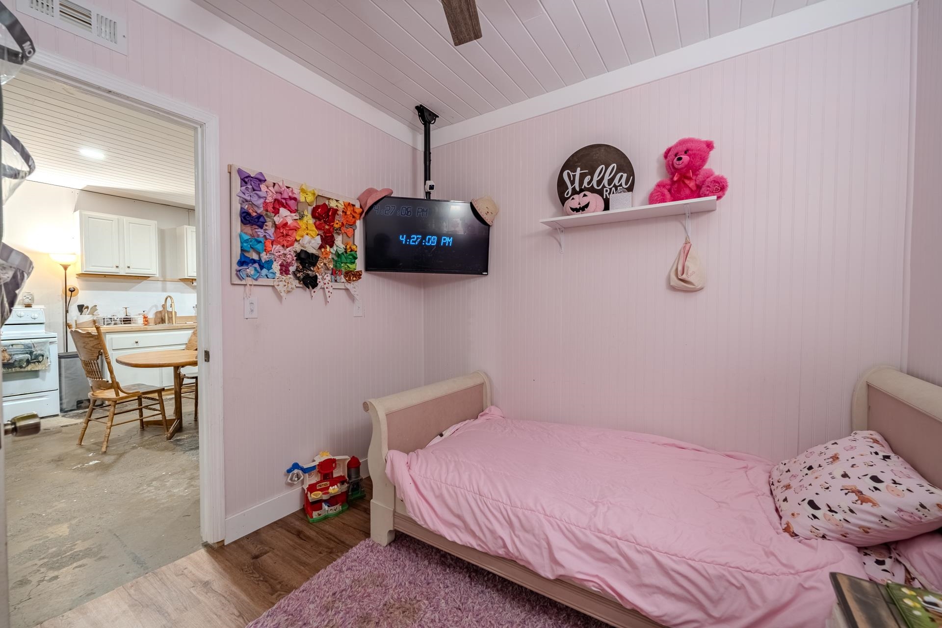 390 Woods Road Adamsville, TN 38310 - Photo 15 of 40 a bedroom with a bed and furniture