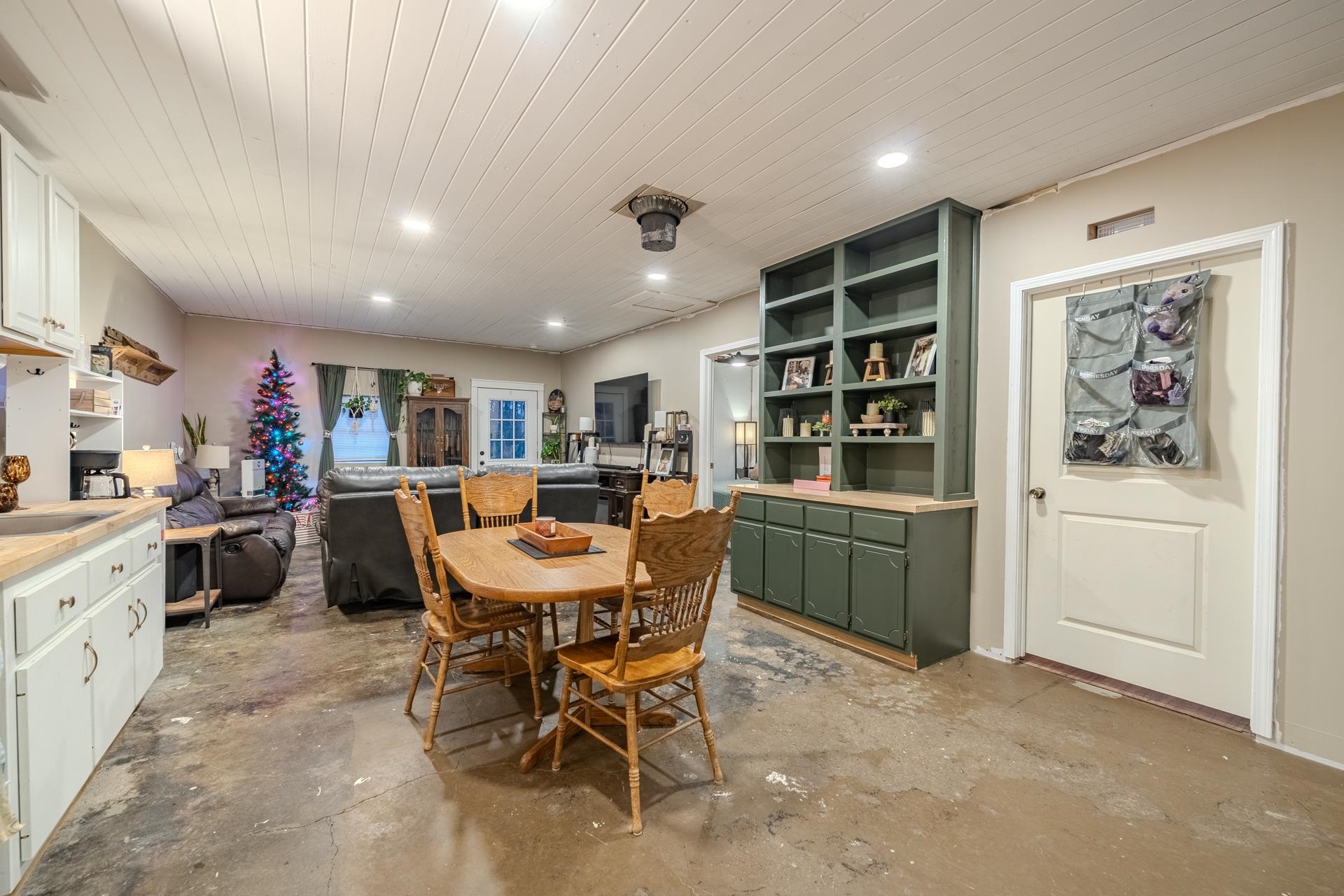 390 Woods Road Adamsville, TN 38310 - Photo 3 of 40 a view of a dining room with furniture and window