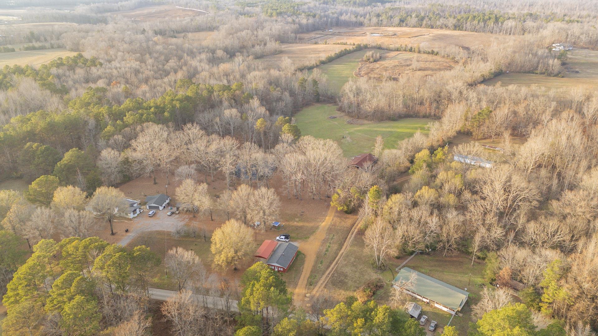 390 Woods Road Adamsville, TN 38310 - Photo 34 of 40 a bathroom with a granite countertop
