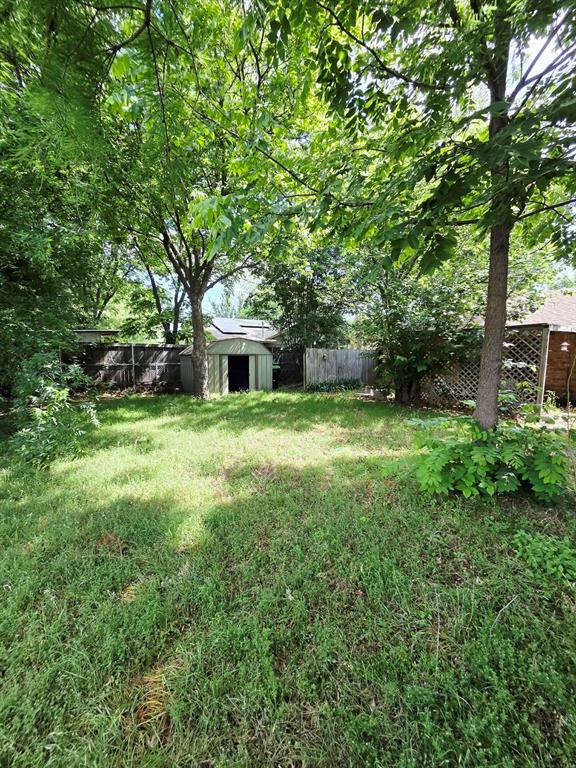 722 South Church Street Pilot Point, TX 76258 - Photo 24 of 37 a view of a house with a yard balcony and sitting area