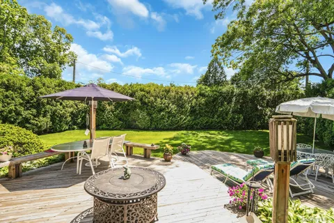 an outdoor space with patio and pool