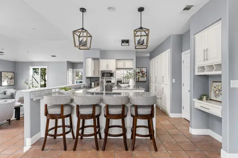 a view of dining room and chandelier