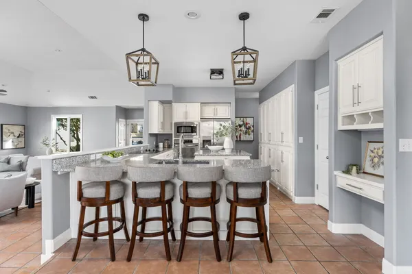 a view of dining room and chandelier