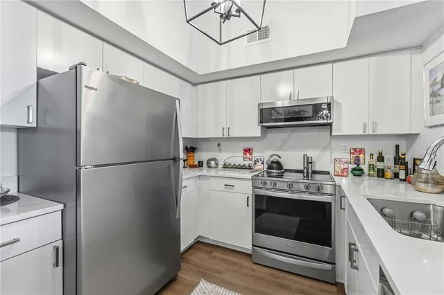 a view of a kitchen area with furniture and window