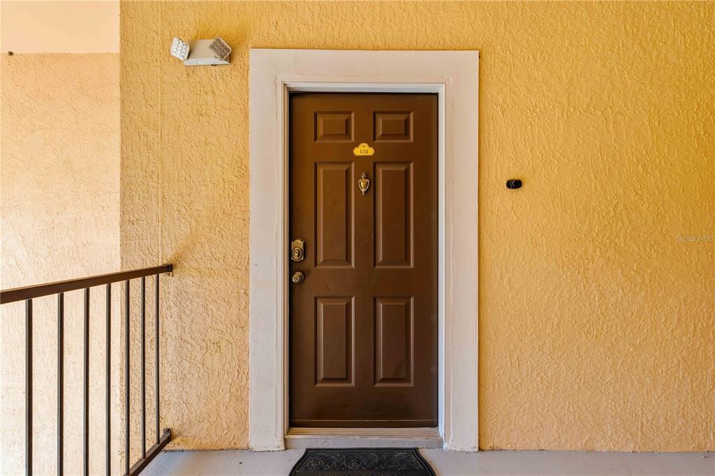 4110 Central Sarasota Parkway, Unit 134 Sarasota, FL 34238 - Photo 4 of 32 a view of a front door