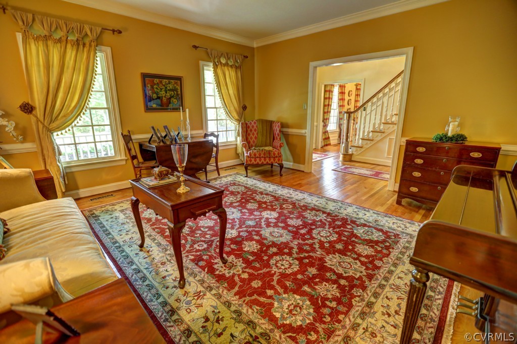 14420 Helmsley Road Midlothian, VA 23113 - Photo 3 of 24 a living room with furniture and a flat screen tv