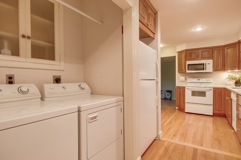 11 Douglas Road Chelmsford, MA 01824 - Photo 13 of 18 a kitchen with a sink cabinets and stainless steel appliances