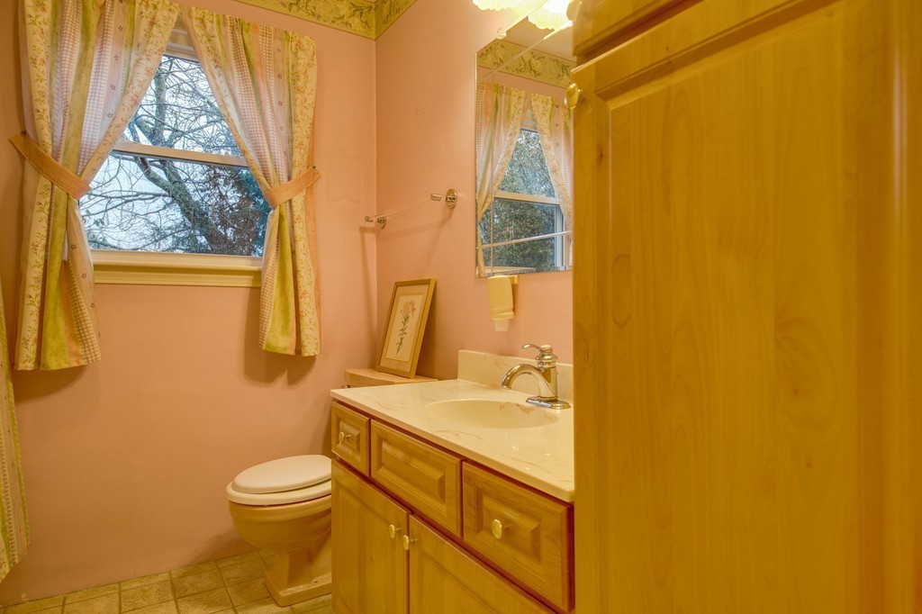 11 Douglas Road Chelmsford, MA 01824 - Photo 17 of 18 a bathroom with a sink and a mirror