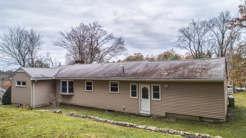 11 Douglas Road Chelmsford, MA 01824 - Photo 2 of 18 a view of a house with a yard