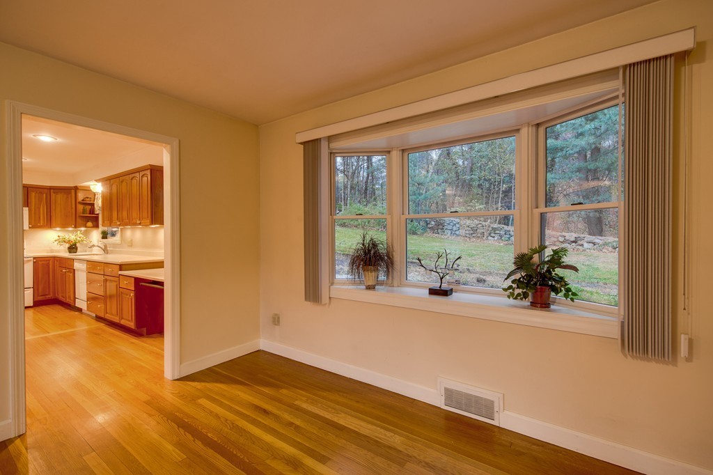 11 Douglas Road Chelmsford, MA 01824 - Photo 4 of 18 a view of a living room hardwood floor and a large window