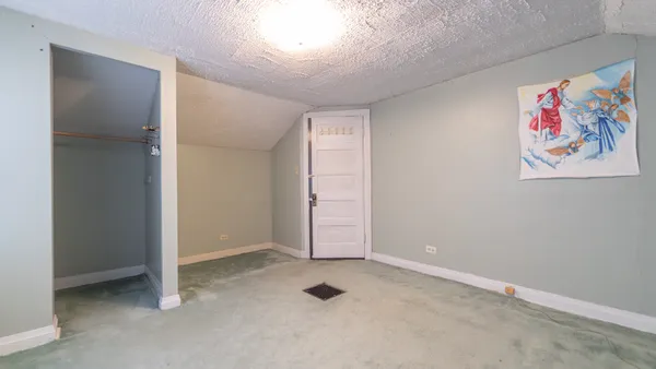 an empty room with closet