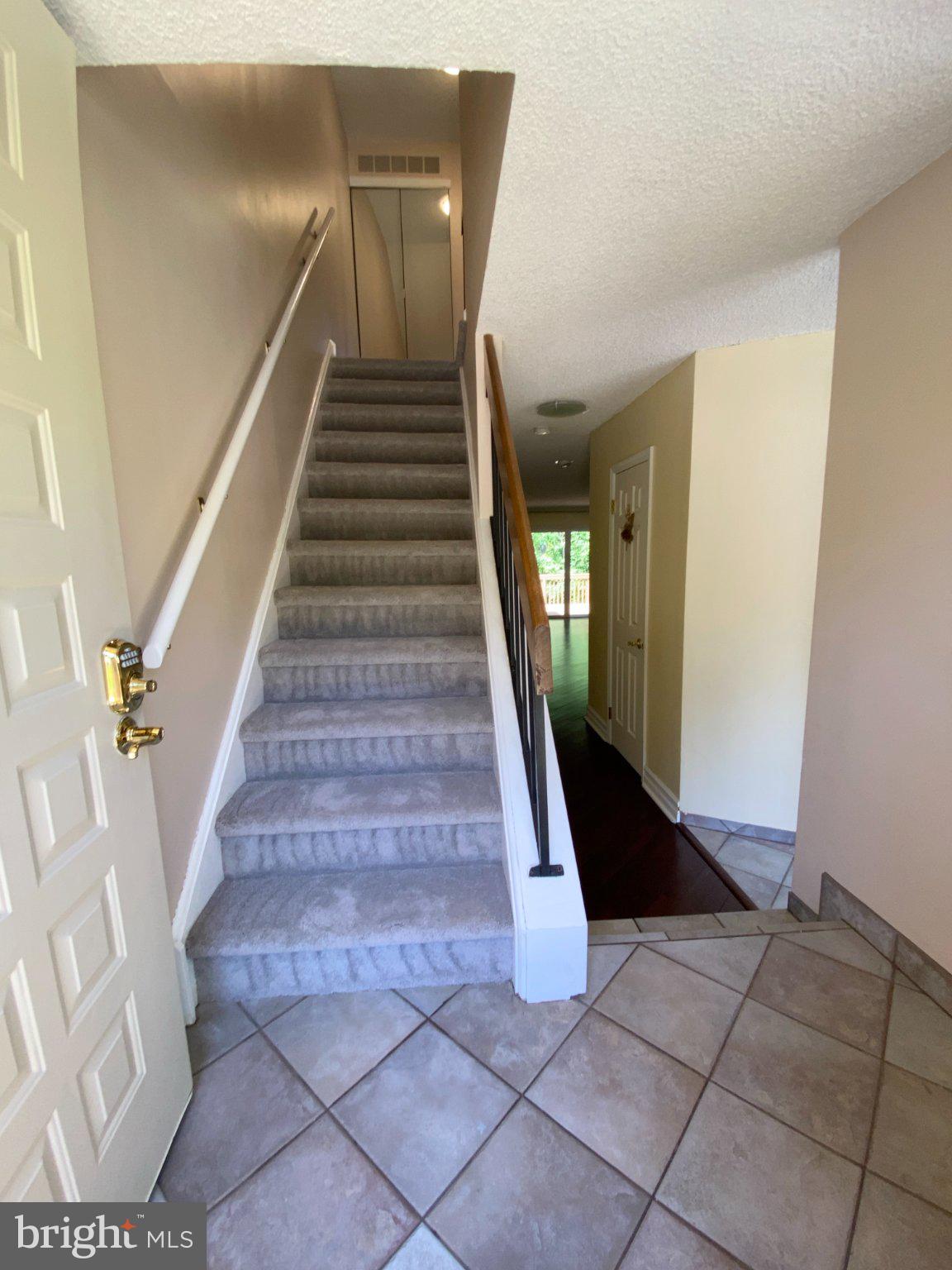 326 Brigade Court Chesterbrook, PA 19087 - Photo 3 of 48 Inviting entryway with staircase charm.