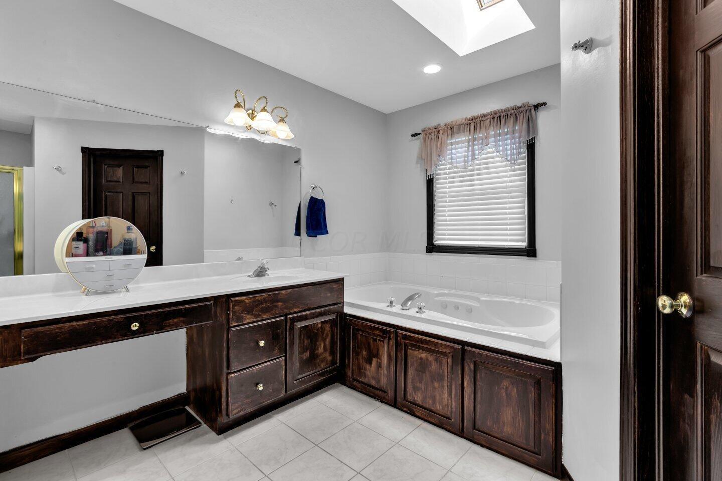 219 Foxcroft Road Mansfield, OH 44904 - Photo 21 of 36 Master Bath Tub & Skylight