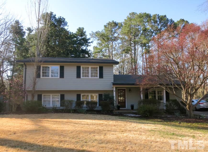 912 Hardimont Road Raleigh, NC 27609 - Photo 1 of 25 a front view of a house with a yard