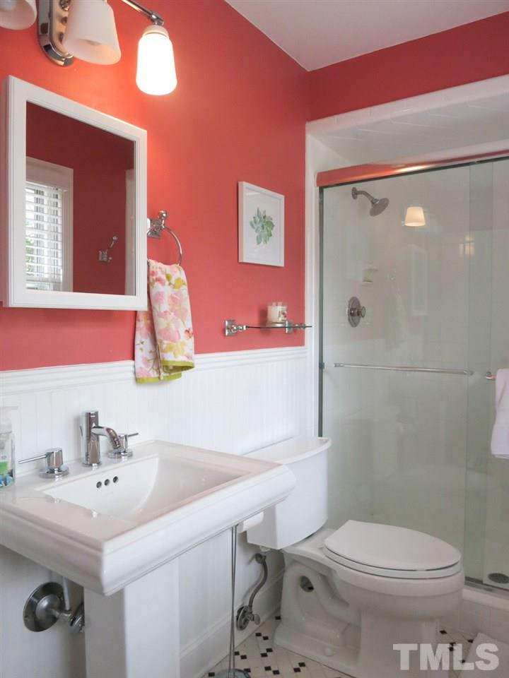 912 Hardimont Road Raleigh, NC 27609 - Photo 16 of 25 a bathroom with a sink toilet and shower