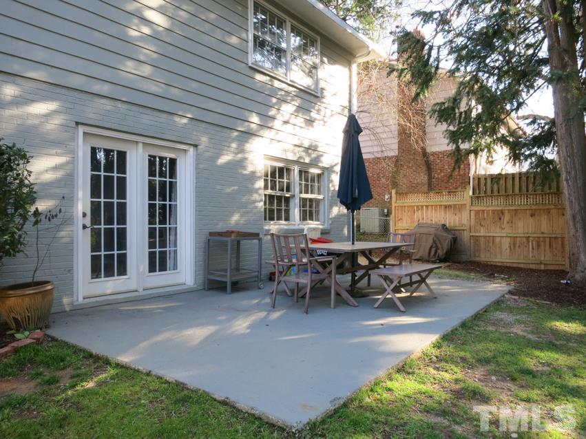 912 Hardimont Road Raleigh, NC 27609 - Photo 22 of 25 a view of a house with backyard and sitting area