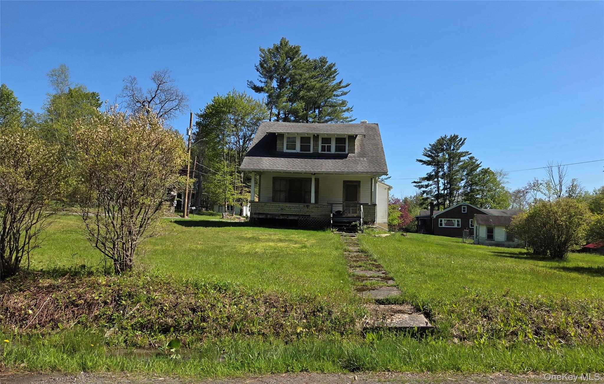 125 Zimmerman Road Loch Sheldrake, NY 12759 - Photo 23 of 43 a front view of a house with garden