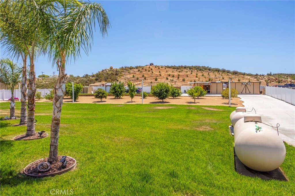 32797 Hayden Road Menifee, CA 92584 - Photo 36 of 51 a view of a backyard with swimming pool