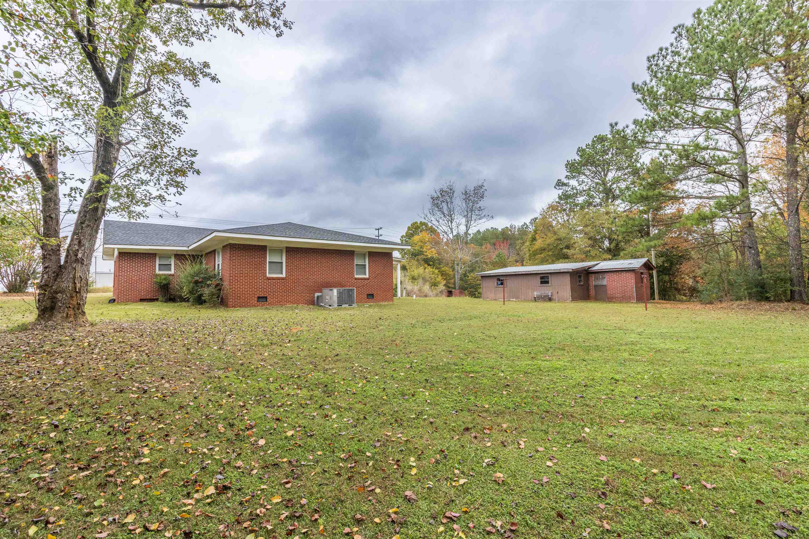 33 Skyline Road Selmer, TN 38375 - Photo 18 of 19 View of yard with central AC unit
