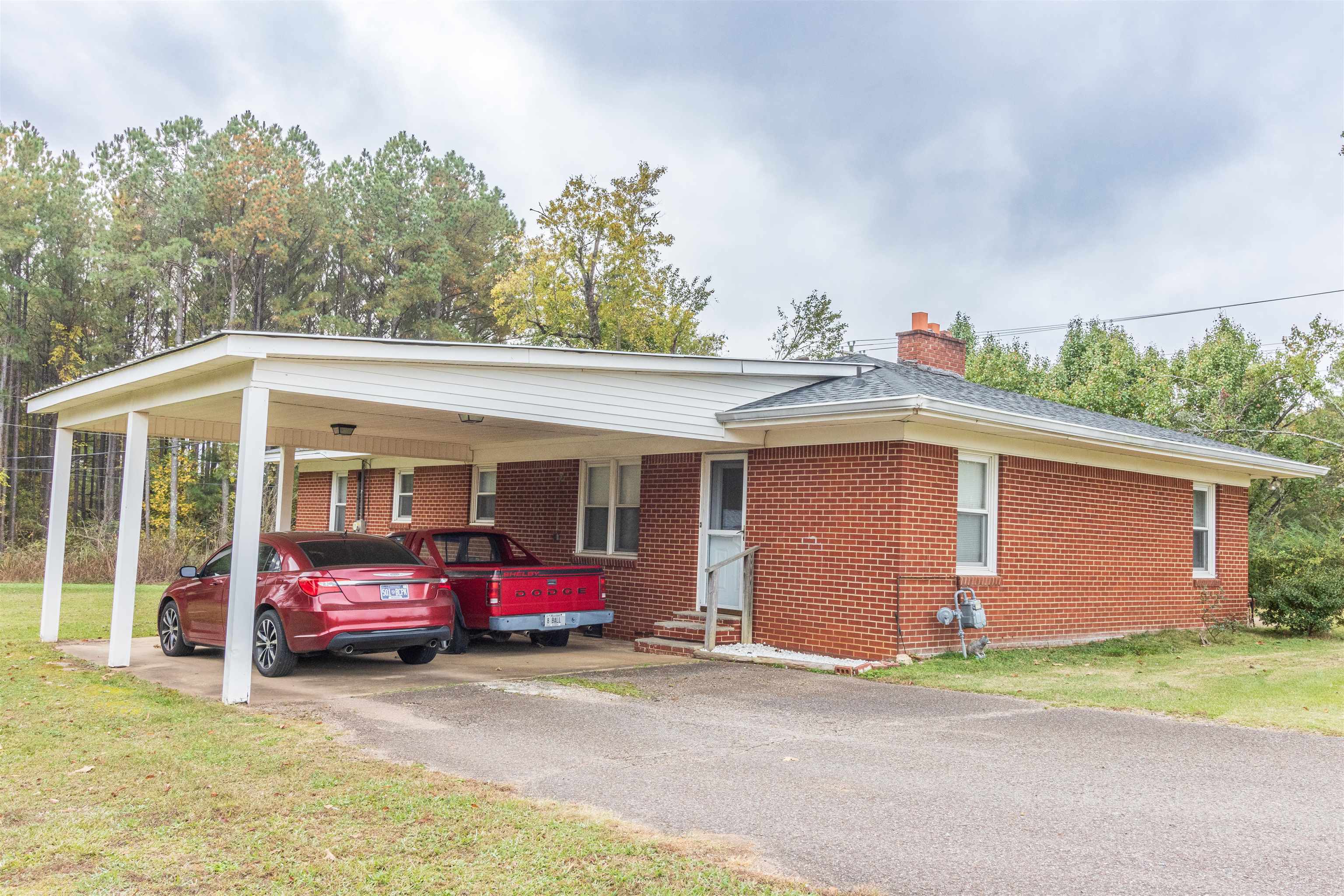 33 Skyline Road Selmer, TN 38375 - Photo 3 of 19 Single story home with a front lawn and a carport
