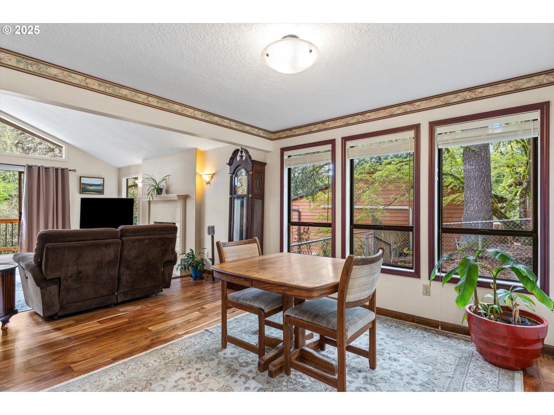 756 Southeast 27th Street Gresham, OR 97080 - Photo 11 of 46 a living room with furniture and a potted plant