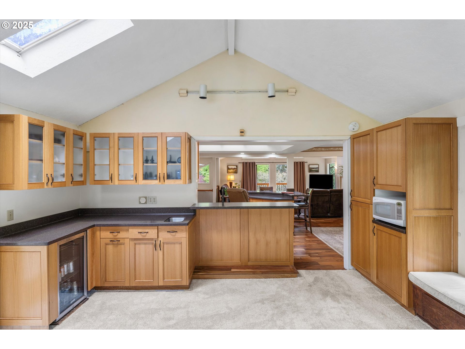 756 Southeast 27th Street Gresham, OR 97080 - Photo 12 of 46 a kitchen with stainless steel appliances granite countertop a sink and cabinets