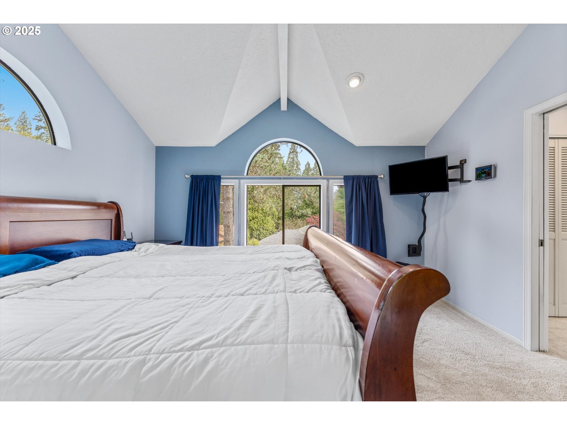 756 Southeast 27th Street Gresham, OR 97080 - Photo 20 of 46 a bedroom with a bed and a large window