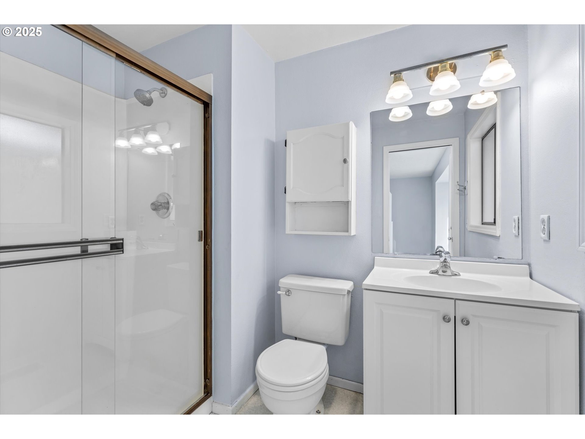 756 Southeast 27th Street Gresham, OR 97080 - Photo 23 of 46 a bathroom with a toilet sink and mirror