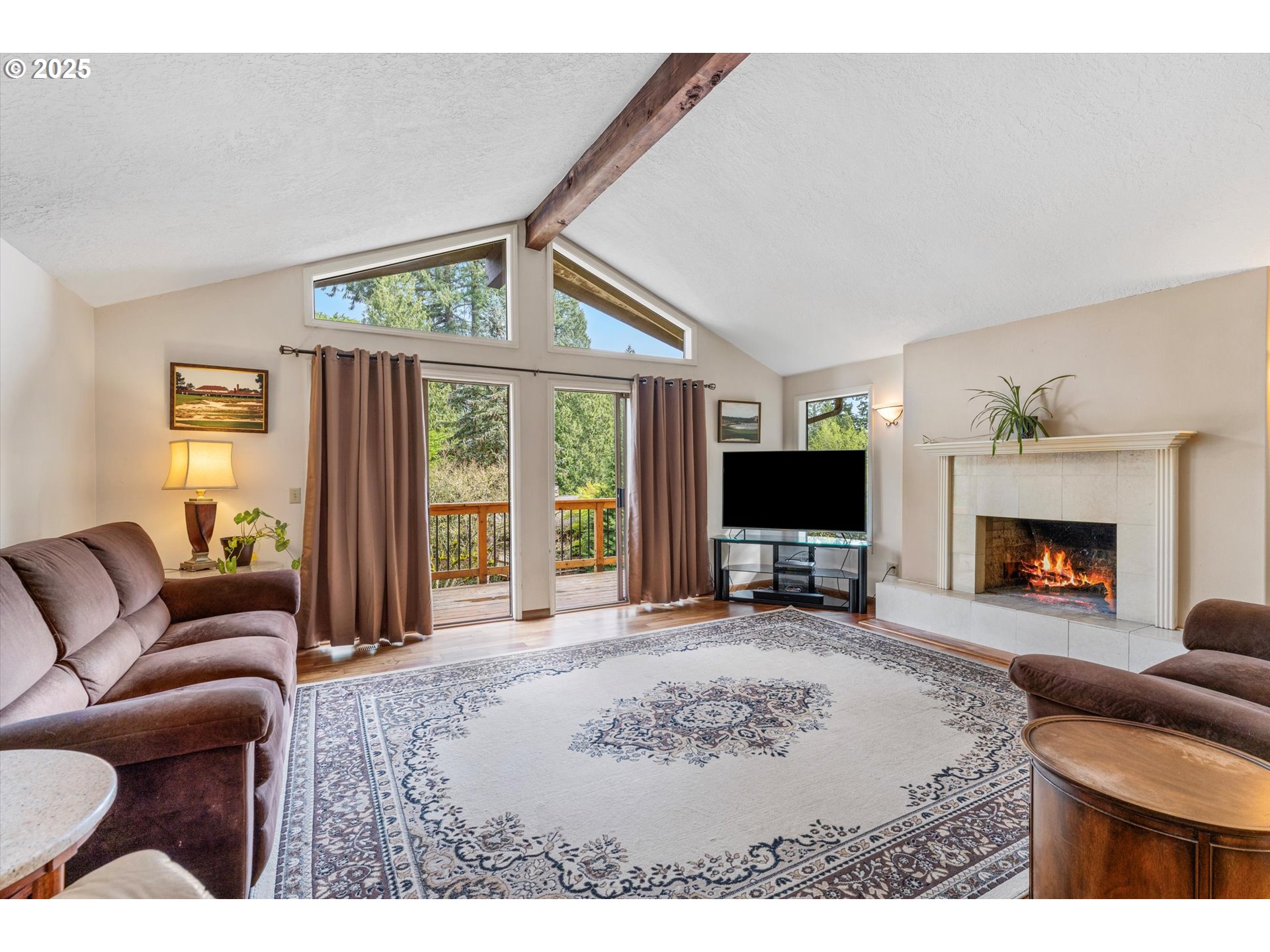 756 Southeast 27th Street Gresham, OR 97080 - Photo 3 of 46 a living room with furniture and a fireplace