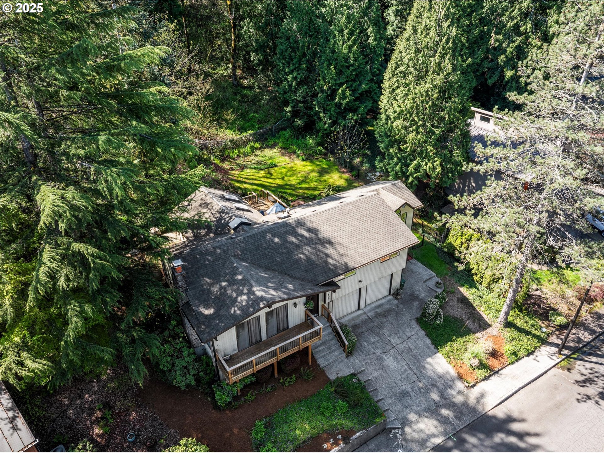 756 Southeast 27th Street Gresham, OR 97080 - Photo 40 of 46 a view of a backyard with chairs and potted plants
