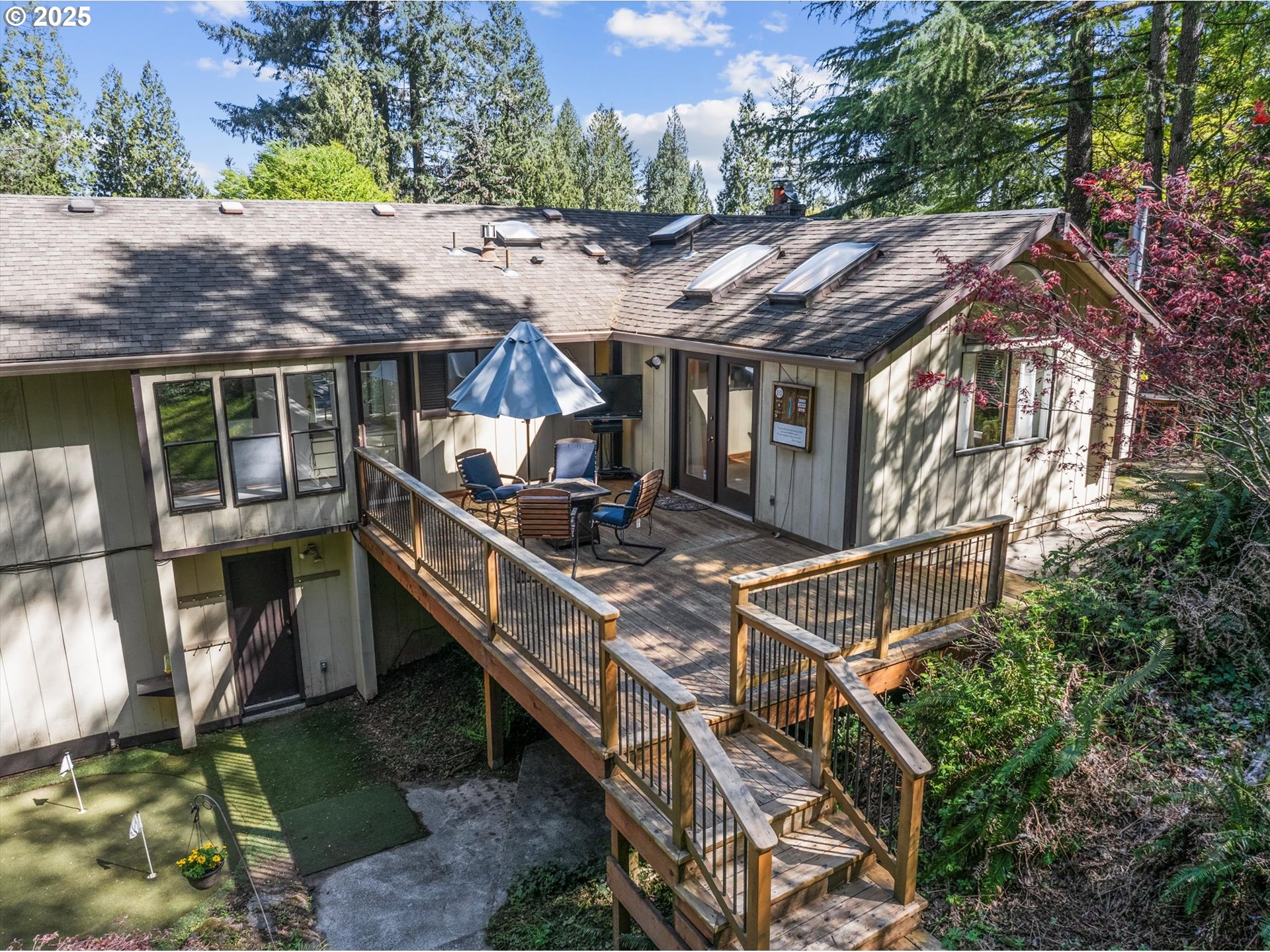 756 Southeast 27th Street Gresham, OR 97080 - Photo 43 of 46 a view of house with backyard outdoor seating and trees