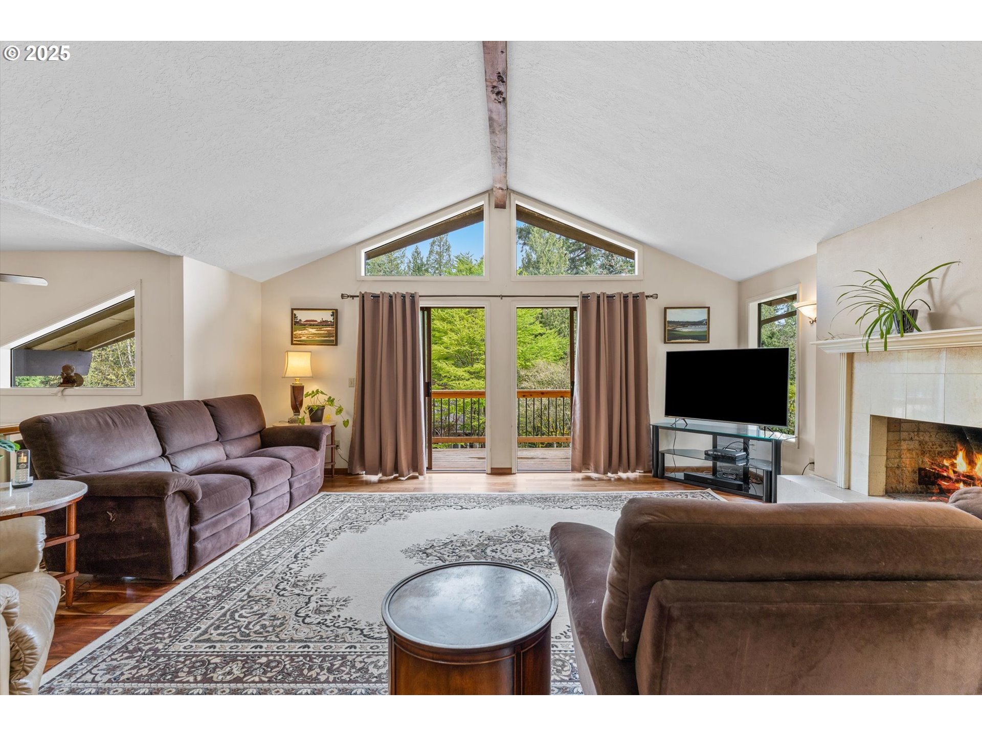 756 Southeast 27th Street Gresham, OR 97080 - Photo 5 of 46 a living room with furniture and a flat screen tv