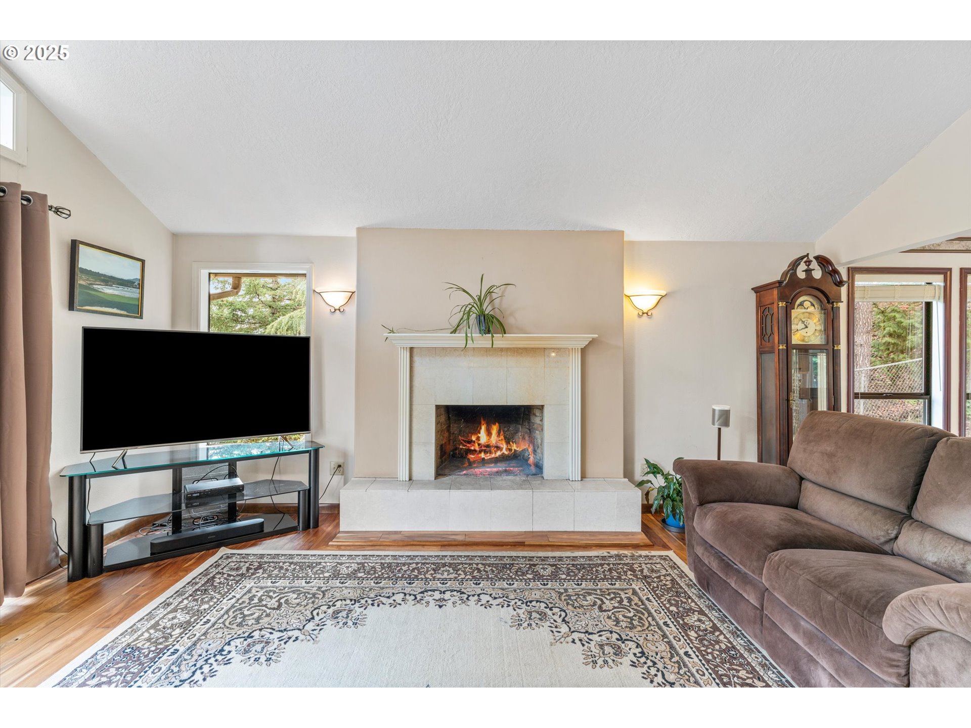 756 Southeast 27th Street Gresham, OR 97080 - Photo 6 of 46 a living room with furniture and a flat screen tv