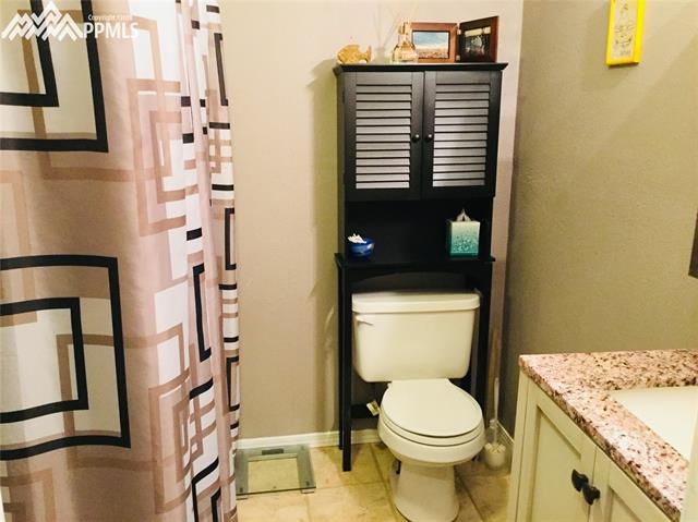 2095 Legacy Ridge View, Unit 112 Colorado Springs, CO 80910 - Photo 27 of 28 Please note this bathroom is located in the bonus room area that is currently used as the master bedroom.