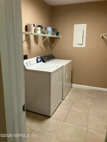 a view of a kitchen with a sink