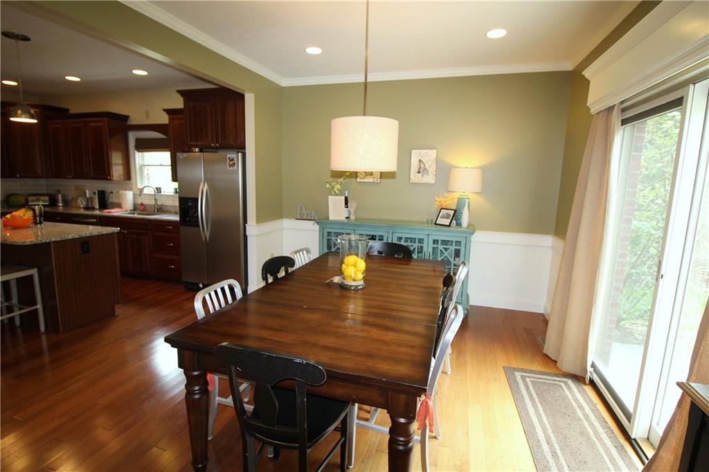 2138 Beams Run Road Jefferson Hills, PA 15025 - Photo 8 of 25 The dining room is open to the kitchen and features recessed lightning, crown and chair moldings, and a sliding door to rear patio.