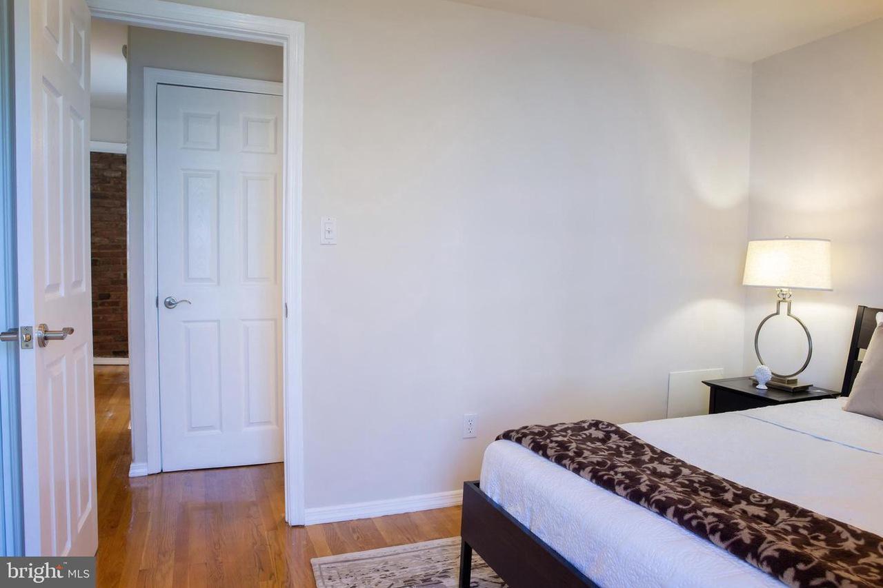 726 6th Street Northeast, Unit 1 Washington, DC 20002 - Photo 24 of 27 Door leading into hallway from second bedroom.