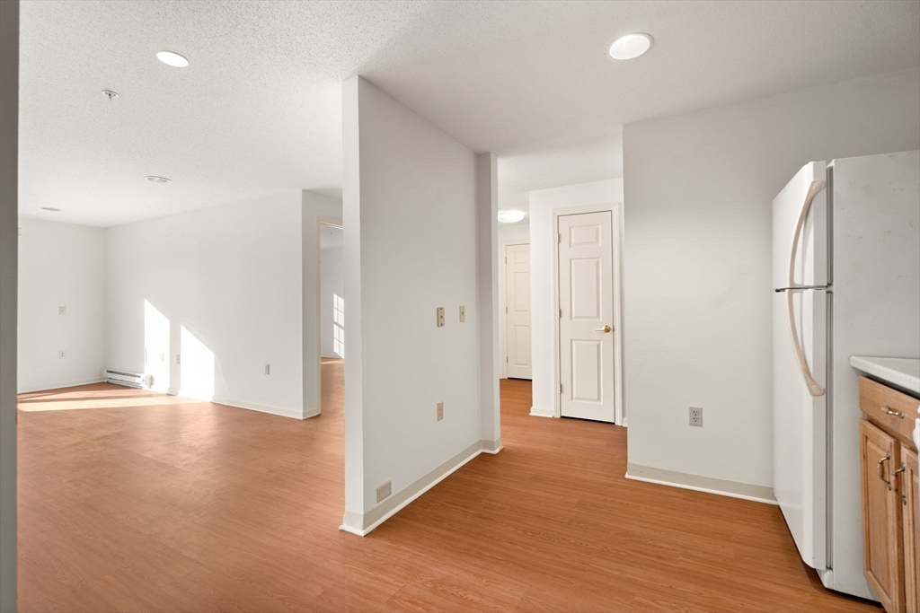 2 Ocean Avenue, Unit 2K Gloucester, MA 01930 - Photo 17 of 26 a view of a livingroom with wooden floor