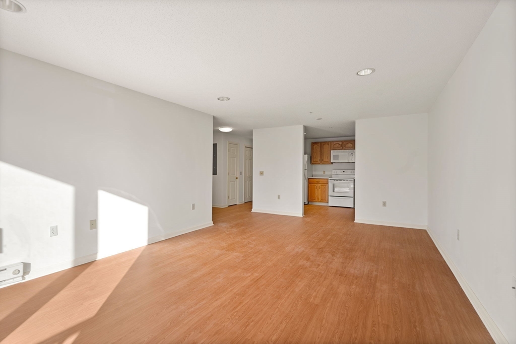 2 Ocean Avenue, Unit 2K Gloucester, MA 01930 - Photo 19 of 26 a big room with closet and windows