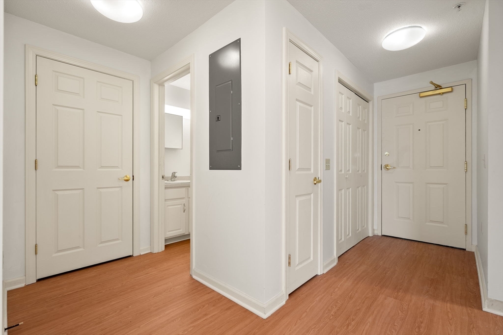 2 Ocean Avenue, Unit 2K Gloucester, MA 01930 - Photo 20 of 26 a view of hallway with wooden floor